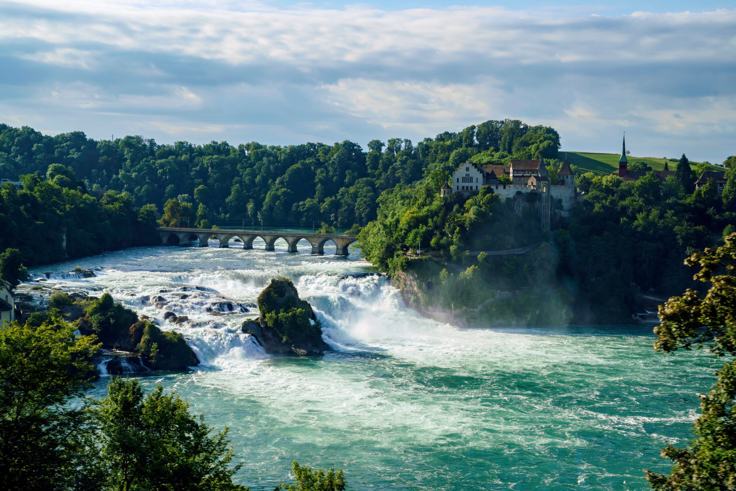 swiss-fixer-swixer-local-production-services-in-switzerland-waterfall-with-castle